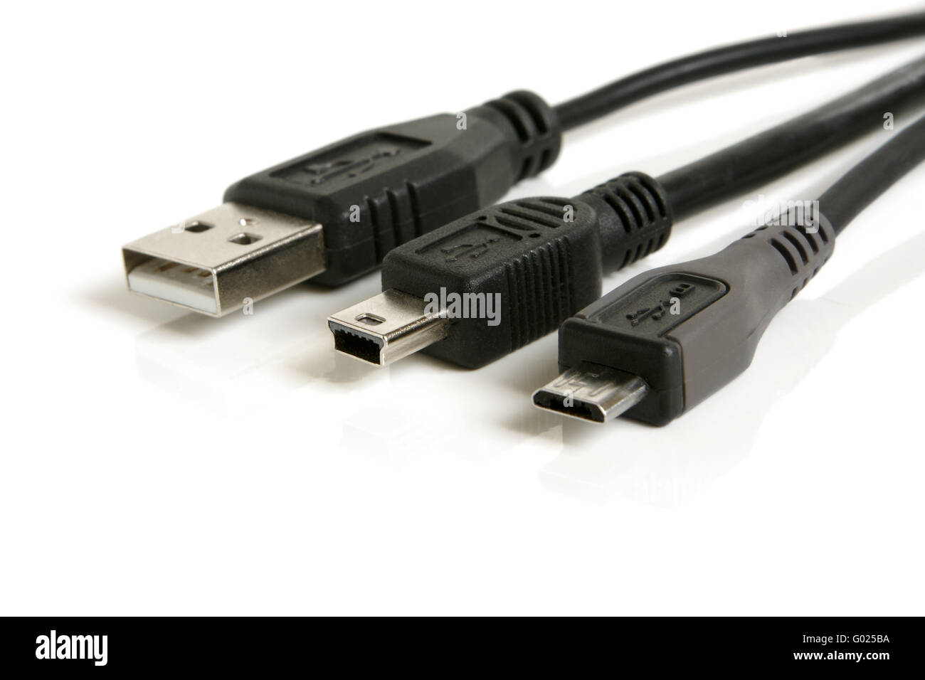 USB, mini-USB and micro-USB cable on a white background Stock Photo