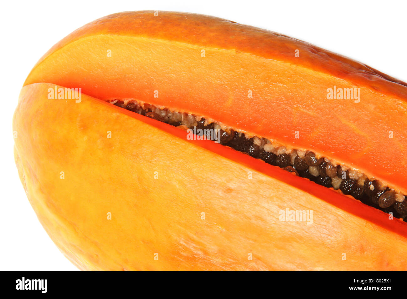 Close-up of bisected orange papaya. Isolated on white Stock Photo
