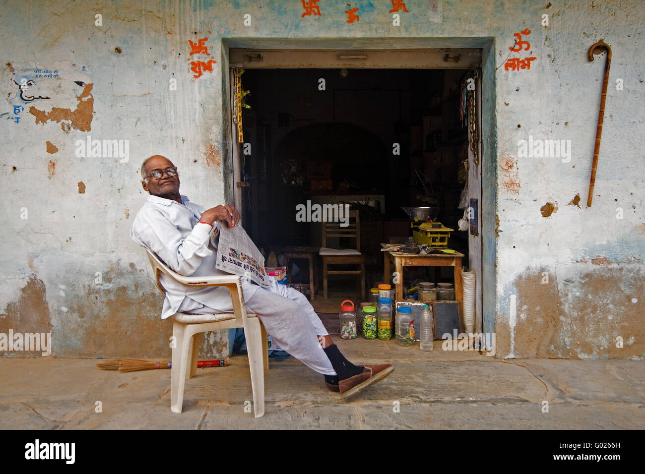 indian old man before a retail business, North India, India, Asia Stock Photo