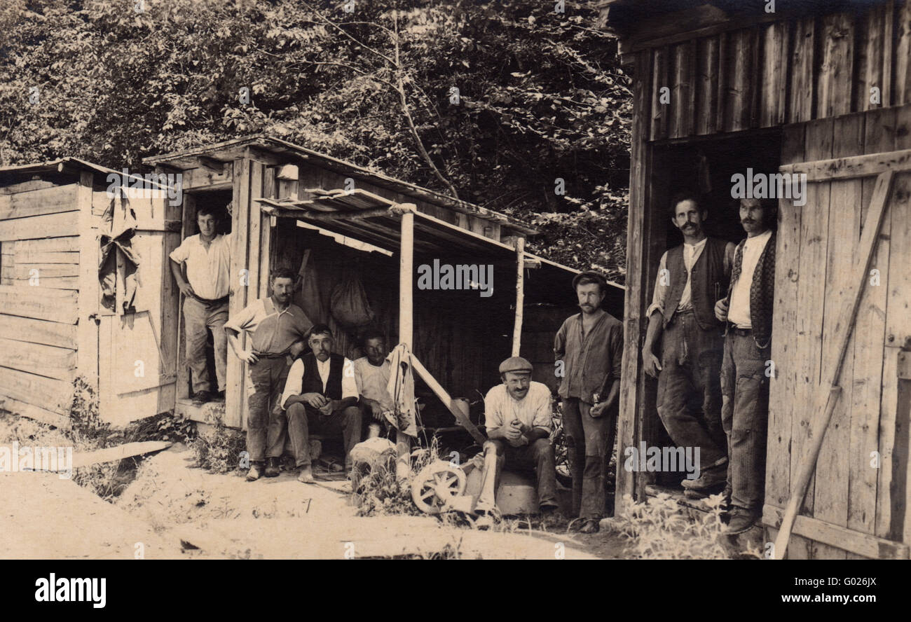 workers in wood sheds, historic photograph, around 1910 Stock Photo
