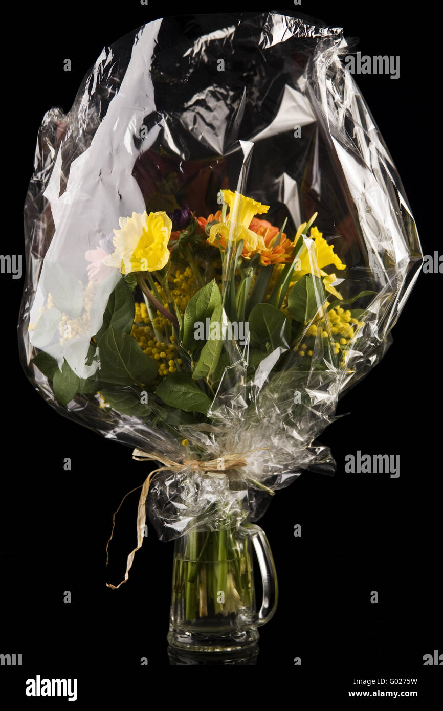 flower bouquet in cellophane packed Stock Photo Alamy