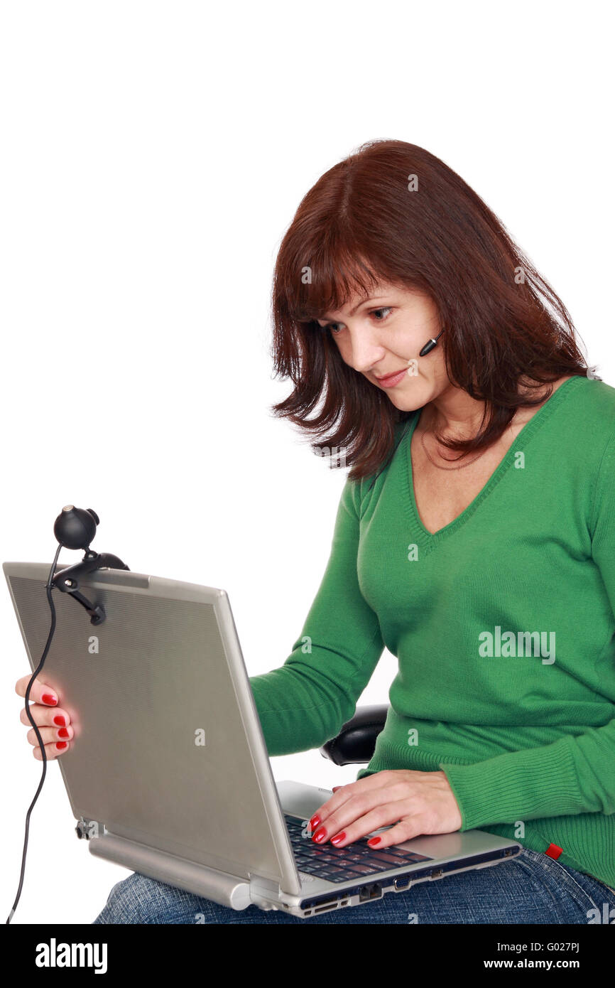 The businesswoman communicates through the Internet Stock Photo