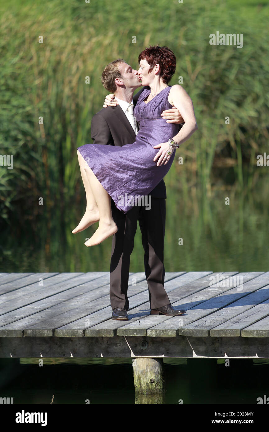 Couple kissing in lake hi-res stock photography and images - Alamy