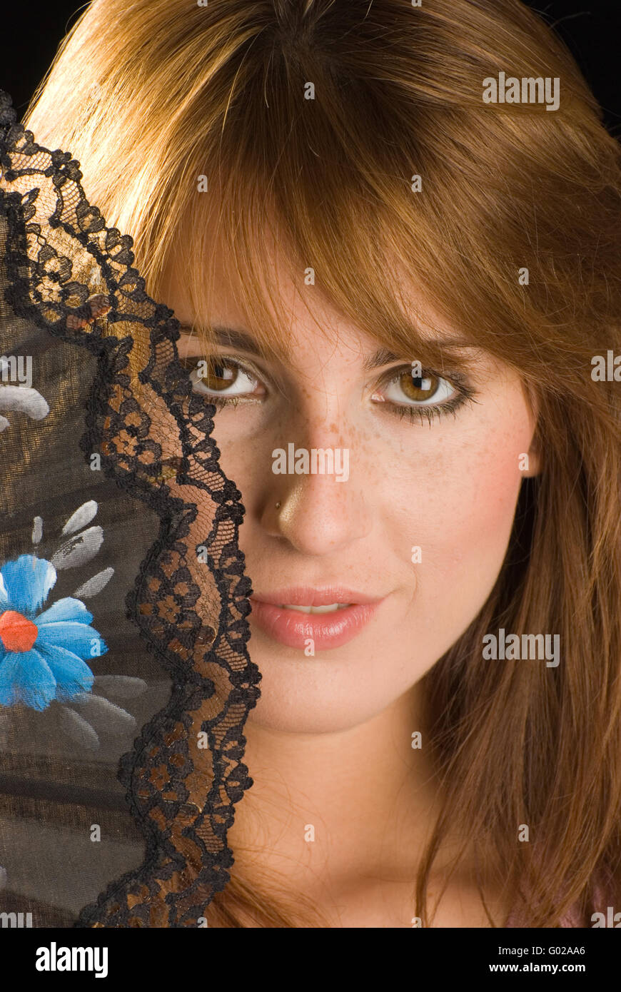 Woman with a Fan Stock Photo