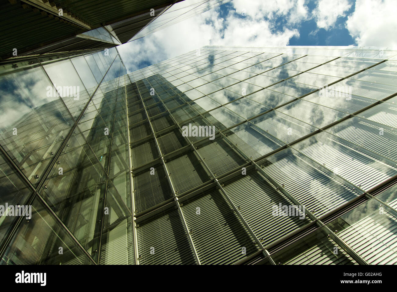 glass facade of a high-rise Stock Photo - Alamy