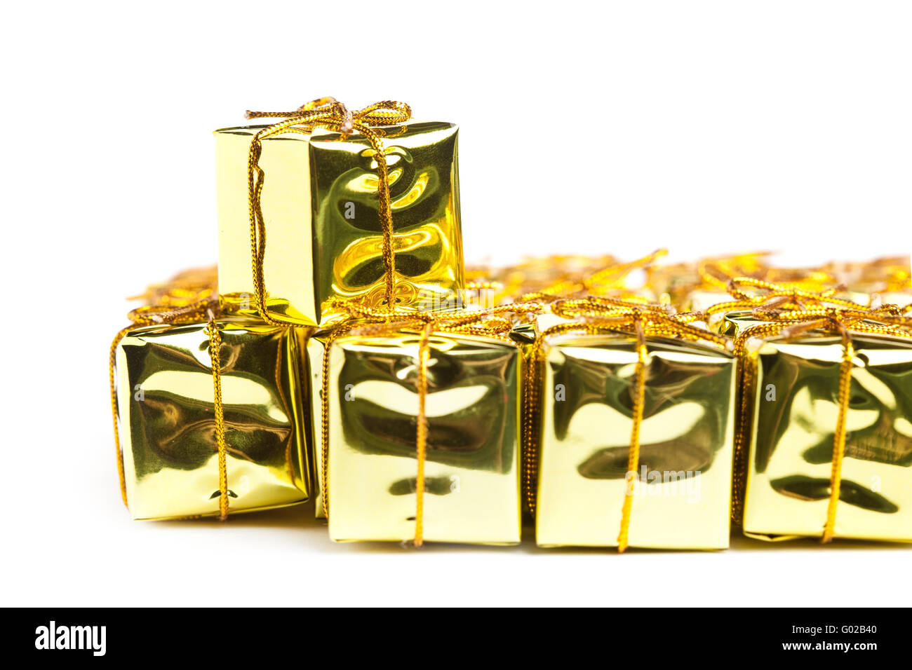 Festive gift boxes isolated on white background Stock Photo - Alamy