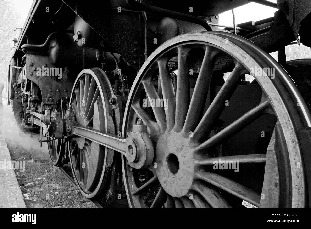 Close up of the wheels and suspension of the old steam engine Stock Photo