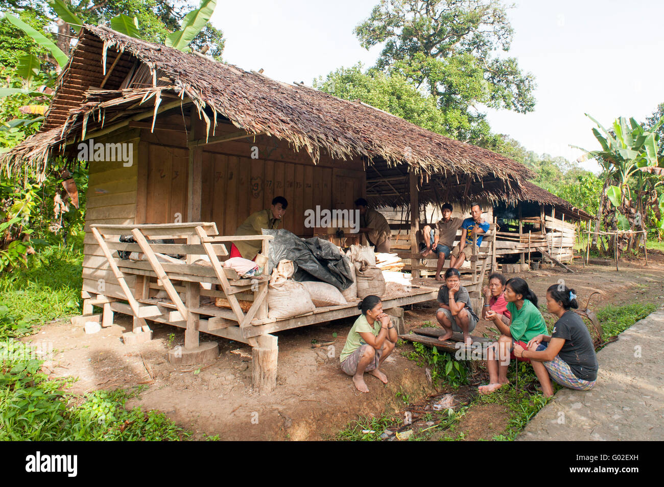 Daily life Mentawai tribe pose for camera.The indigenous inhabitants ethnic of the islands in Muara Siberut Stock Photo