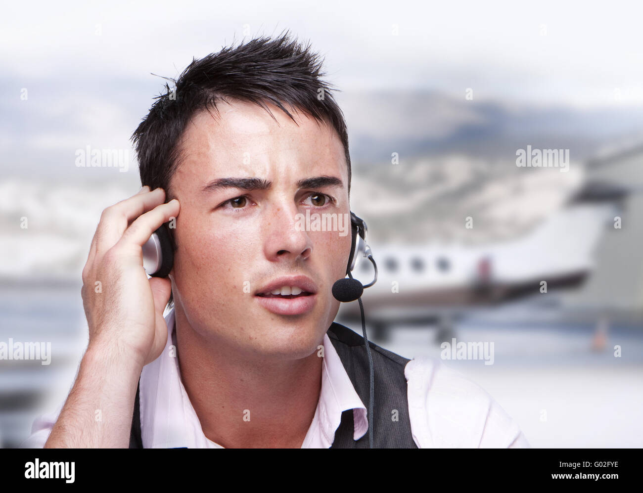 young smiling men operator with headphones portrait Stock Photo