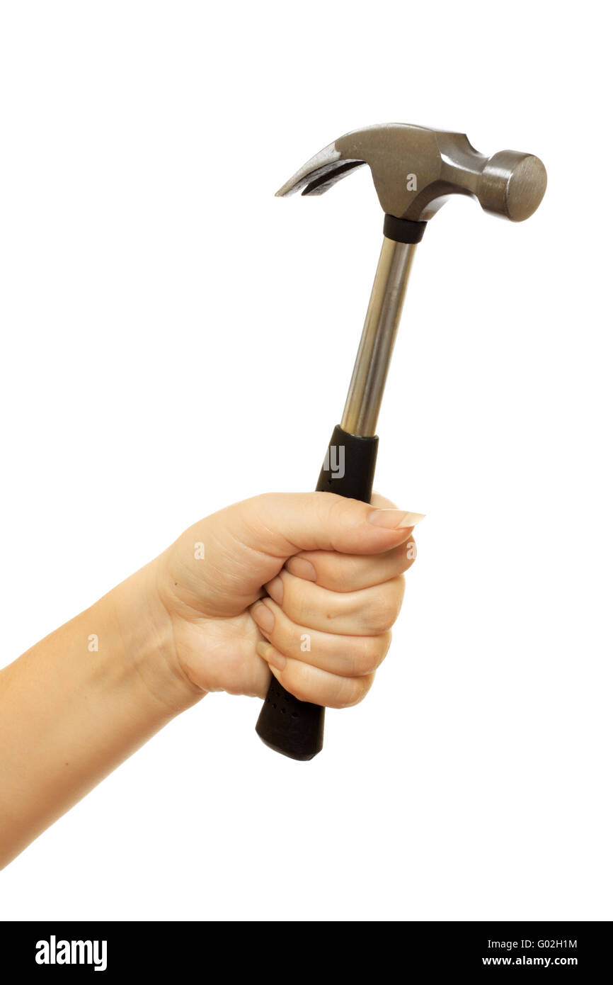 hammer in a beautiful female hand isolated on white background Stock Photo