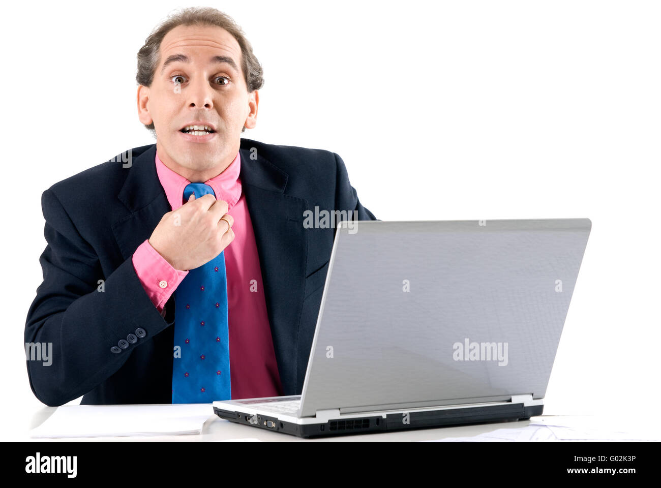 Overload businessman with laptop on white background. Stock Photo