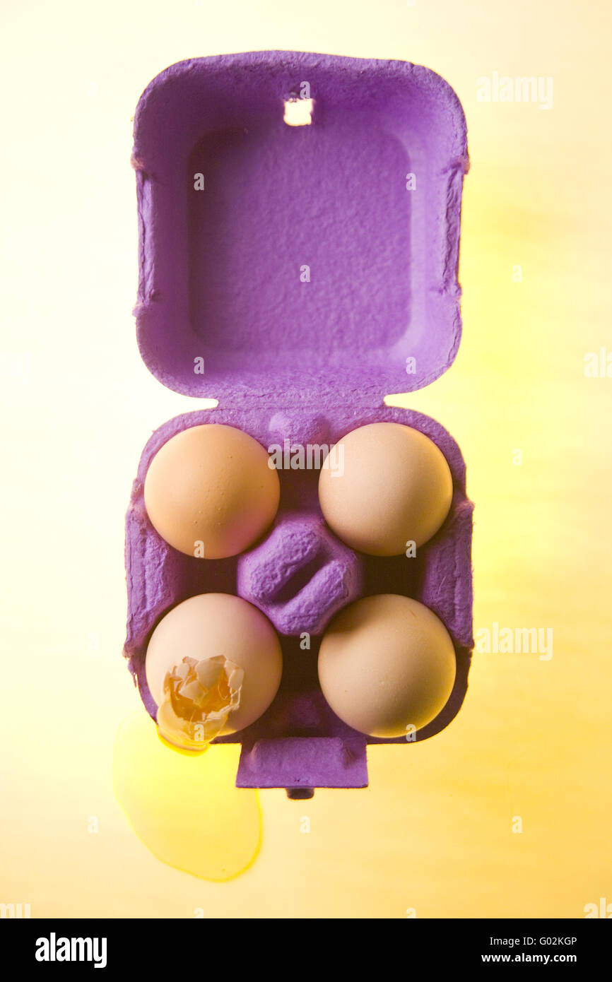 four eggs in a carton Stock Photo