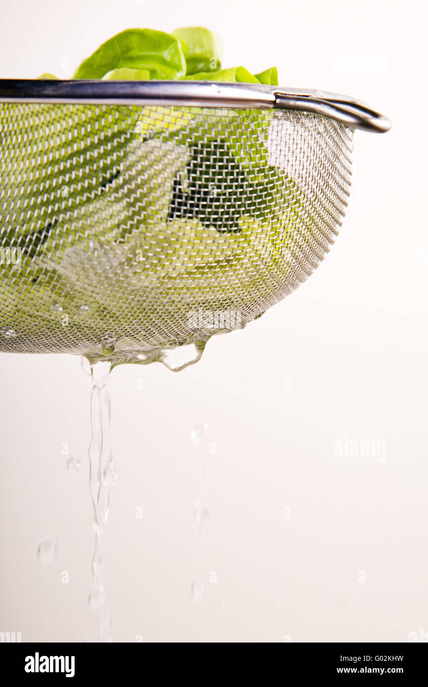 salad with strainer Stock Photo
