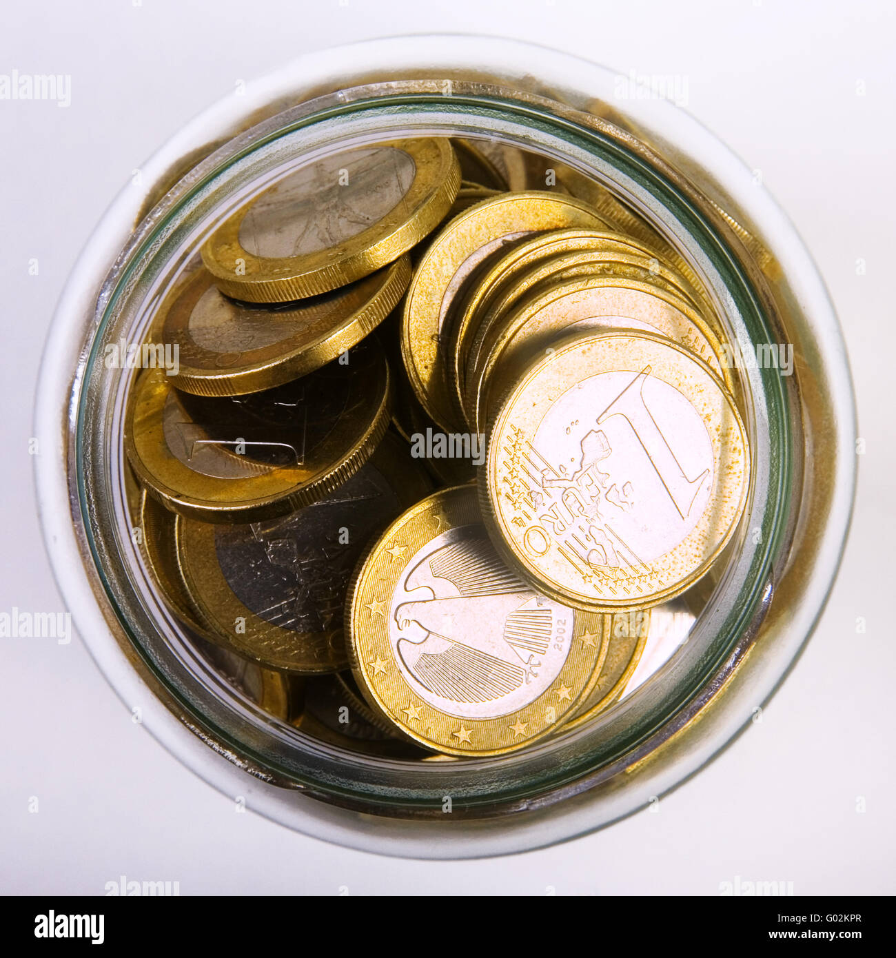 moneybox with euro coints Stock Photo