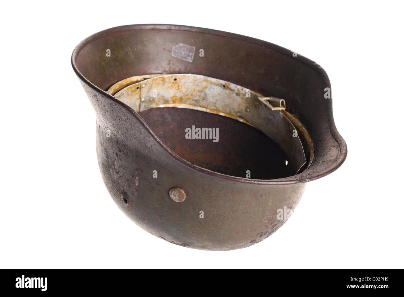 Old German fashists helmet of times of the second Great world war on a white background with clipping path. Stock Photo