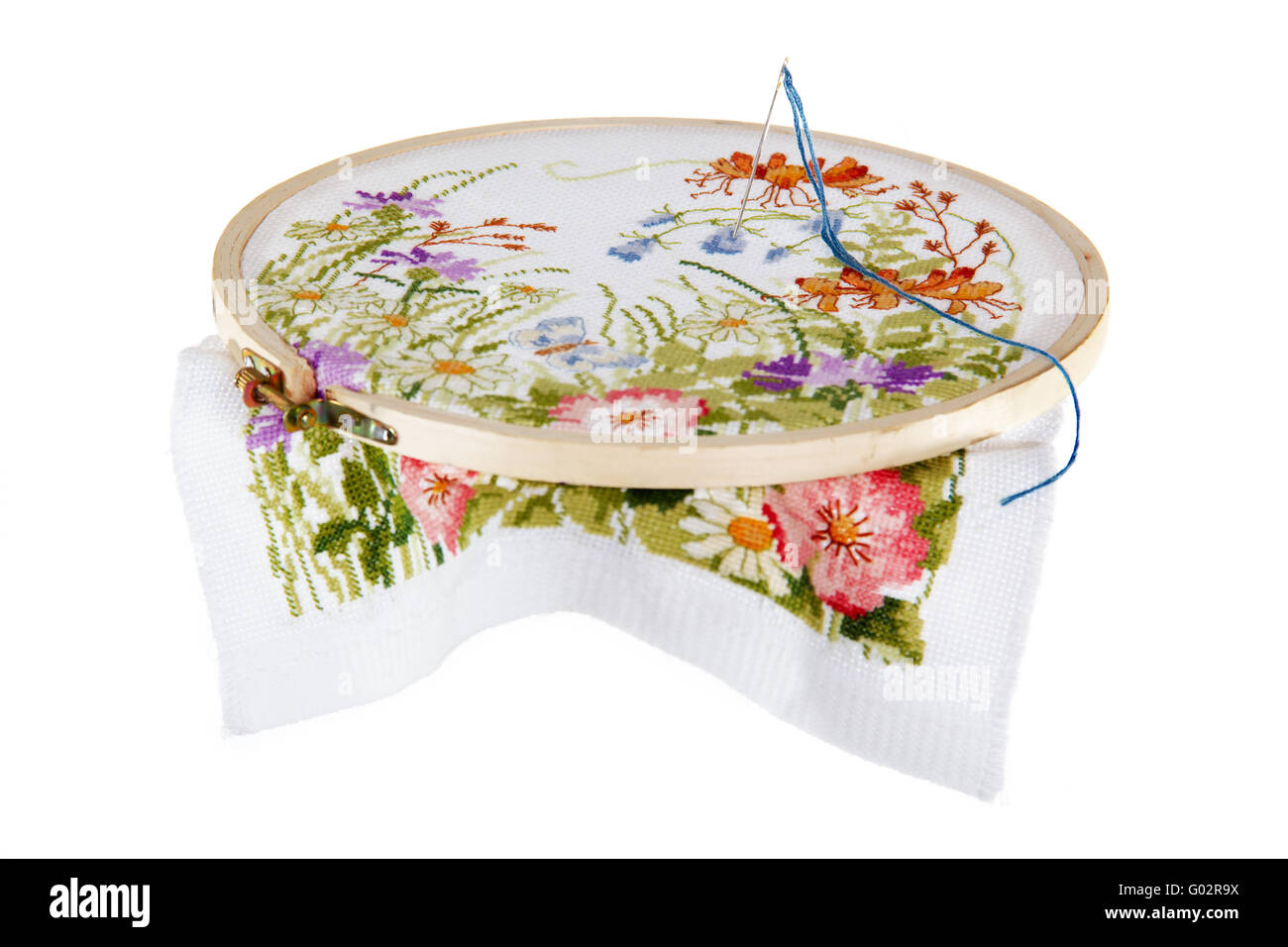 Embroidery of a picture with the image of colours, on a white background. Stock Photo