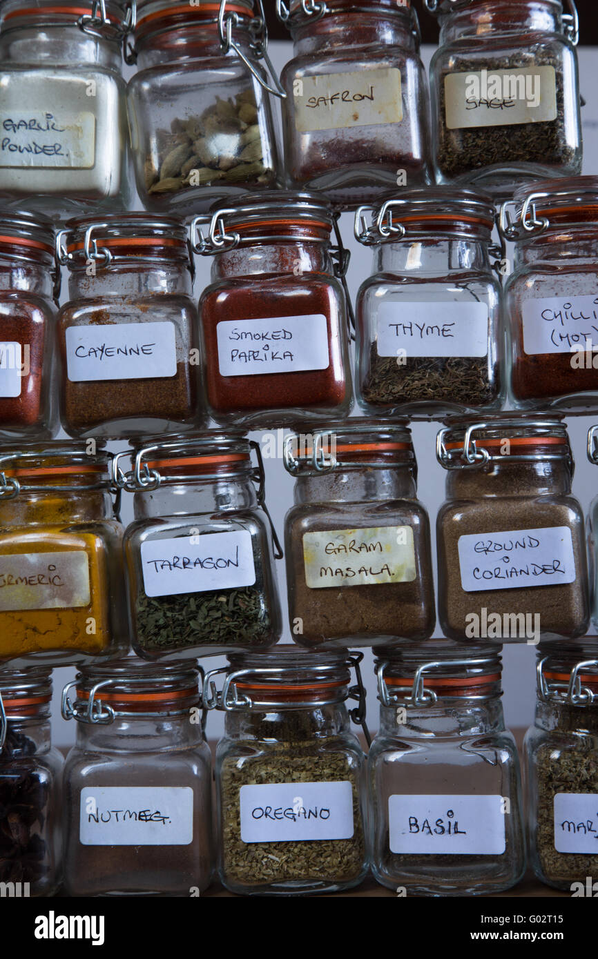 Abstract view of herbs and spices stacked in Kilner jars Stock Photo Alamy
