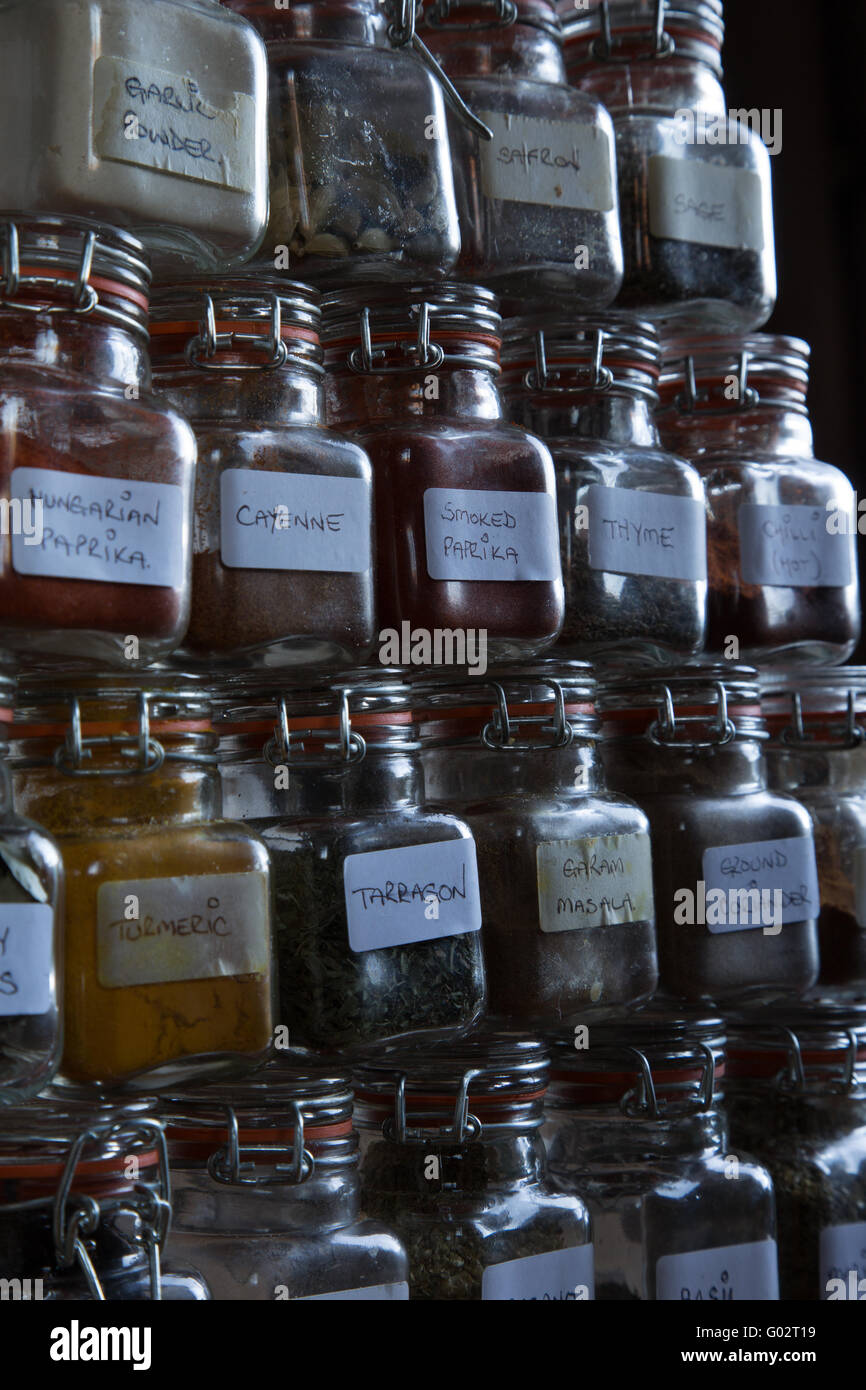 Abstract view of herbs and spices stacked in Kilner jars Stock Photo Alamy