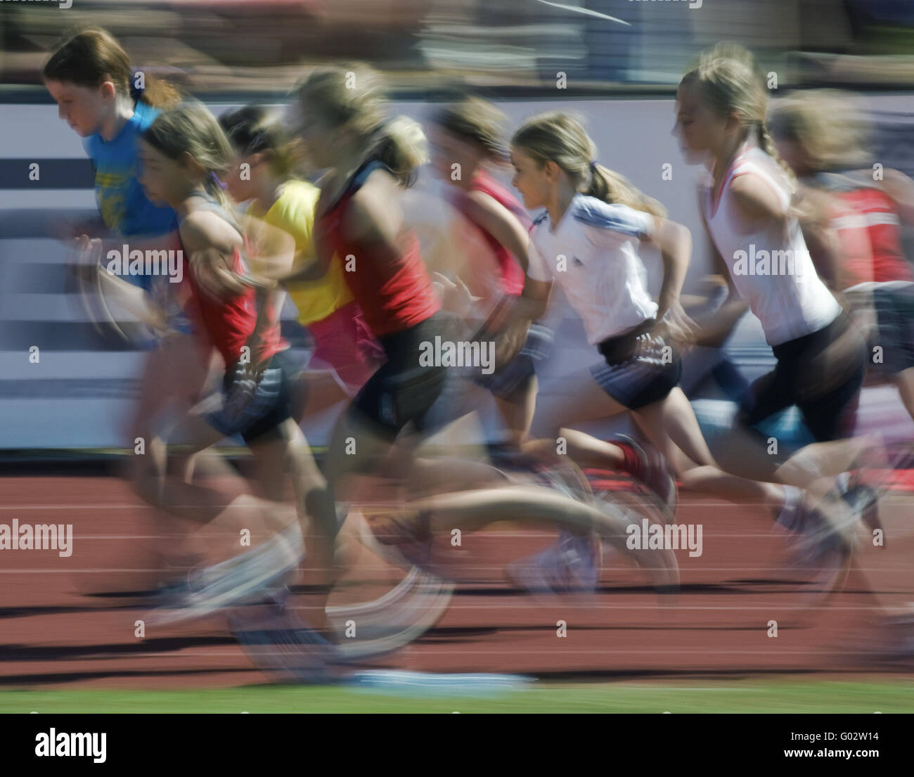Young girls running 600m Stock Photo