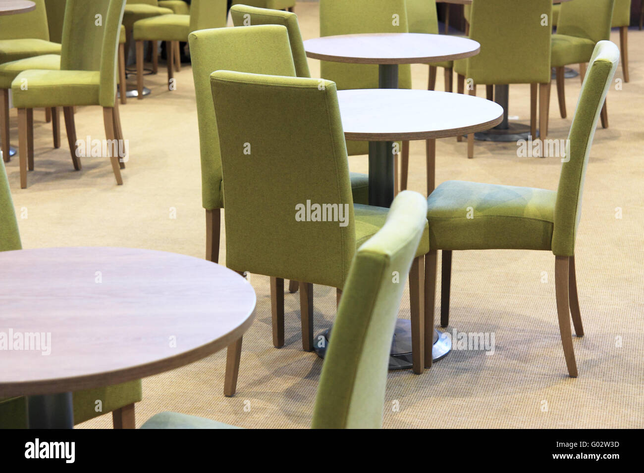 Tables & Green Chairs Stock Photo Alamy