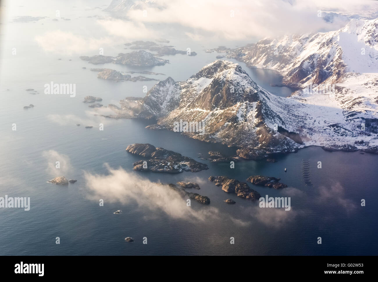 An Aerial View Of The Snow Covered Mountains Of The Lofoten Islands ...