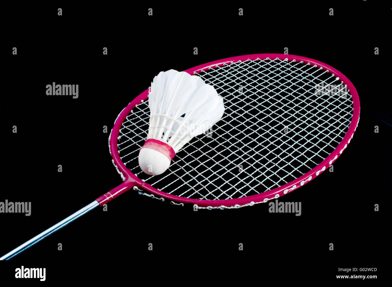 Badminton racket and shuttlecock isolated on a black background Stock ...