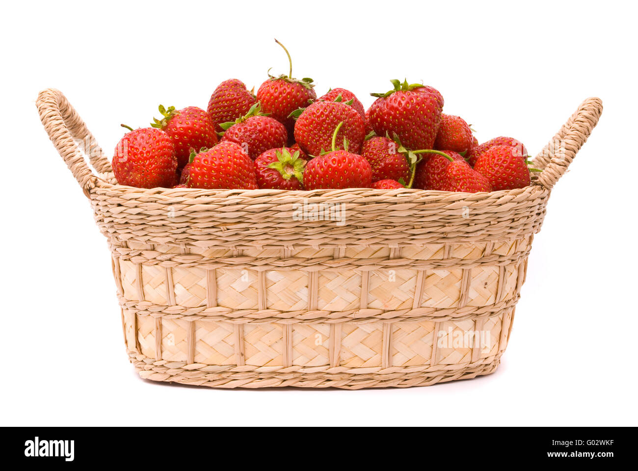 Garden Strawberries in wooden basket isolated on white Stock Photo