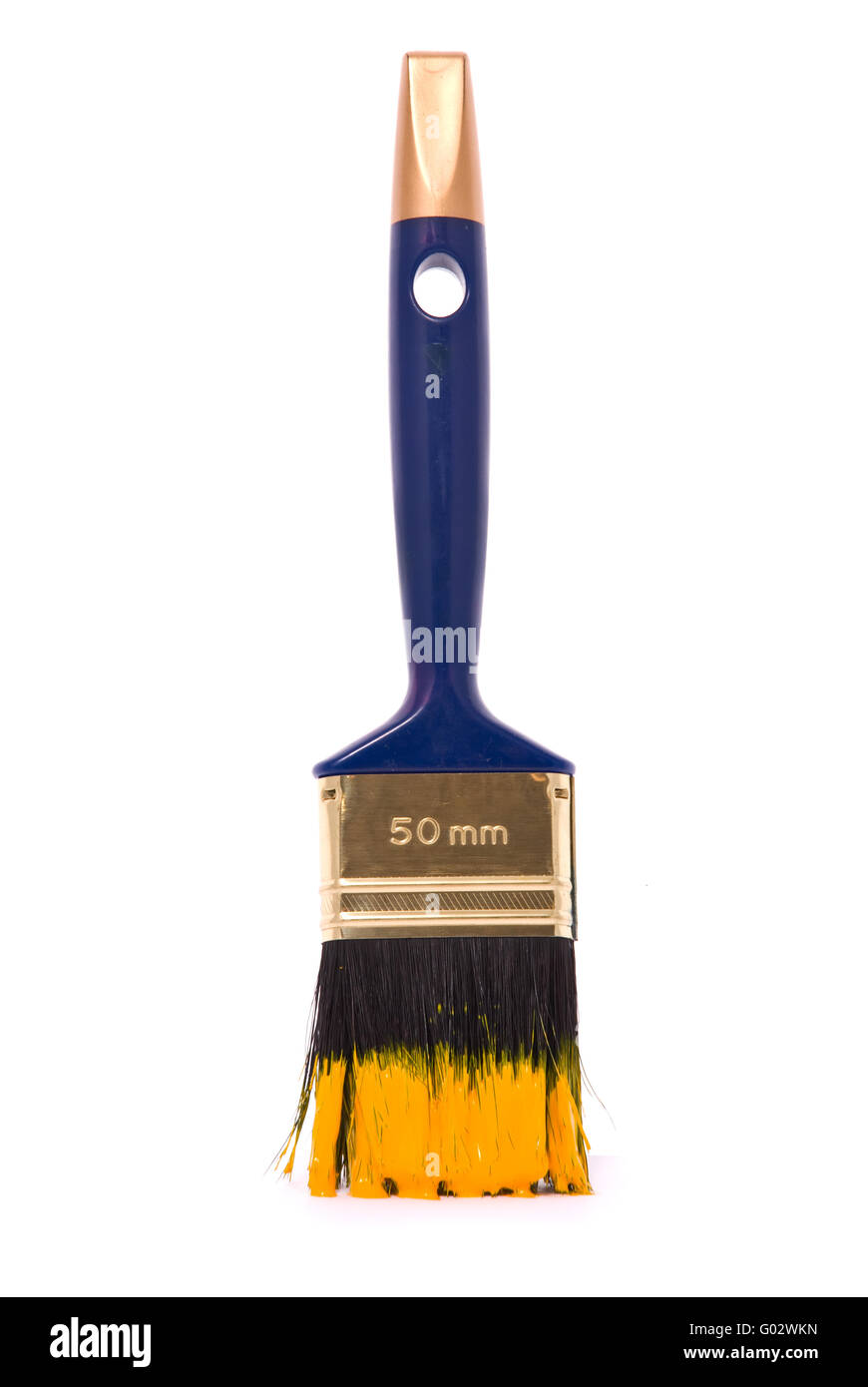 Professional brush with yellow paint on a white background Stock Photo