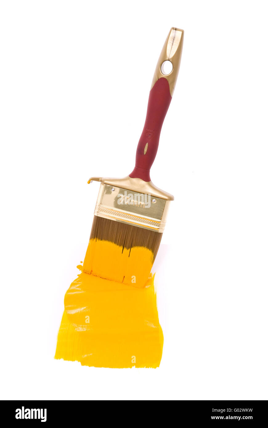 Professional brush with yellow paint on a white background Stock Photo
