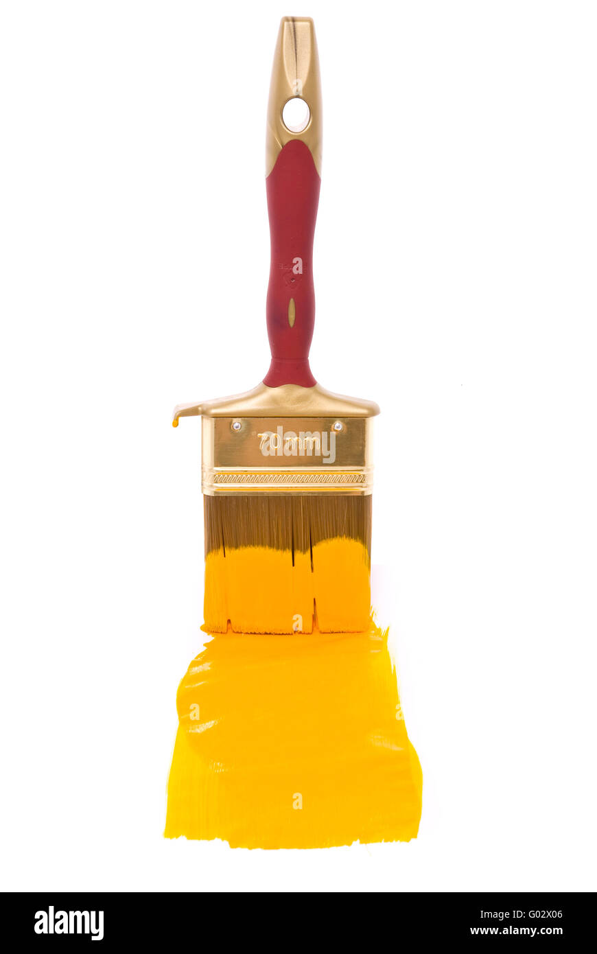 Professional brush with yellow paint on a white background Stock Photo