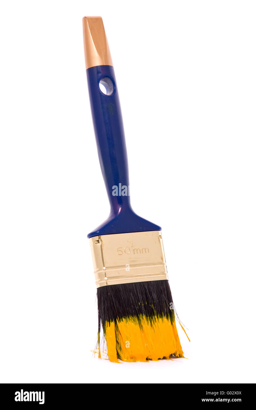 Professional brush with yellow paint on a white background Stock Photo