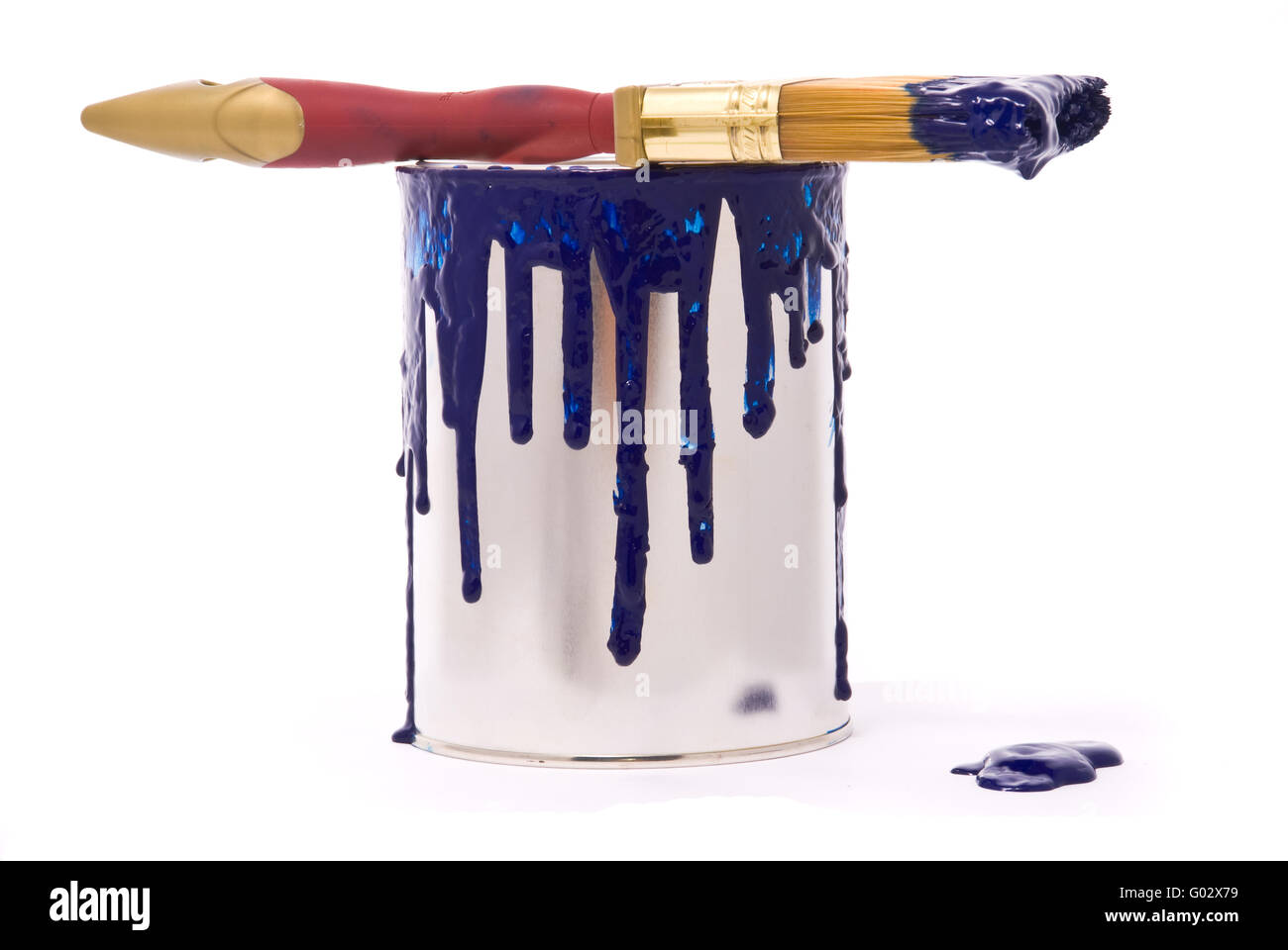 Can of blue paint and professional brush on a white Stock Photo