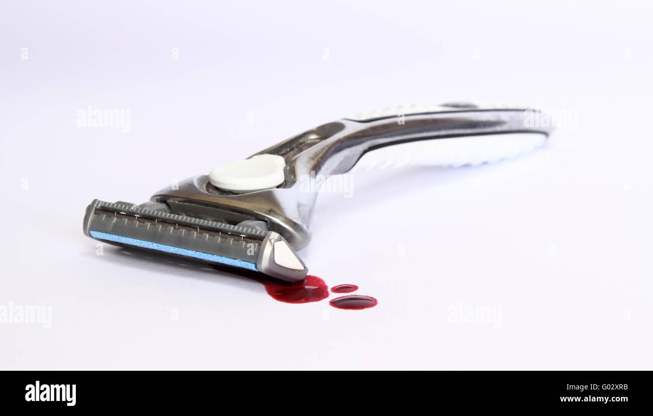 Razor with blood Stock Photo