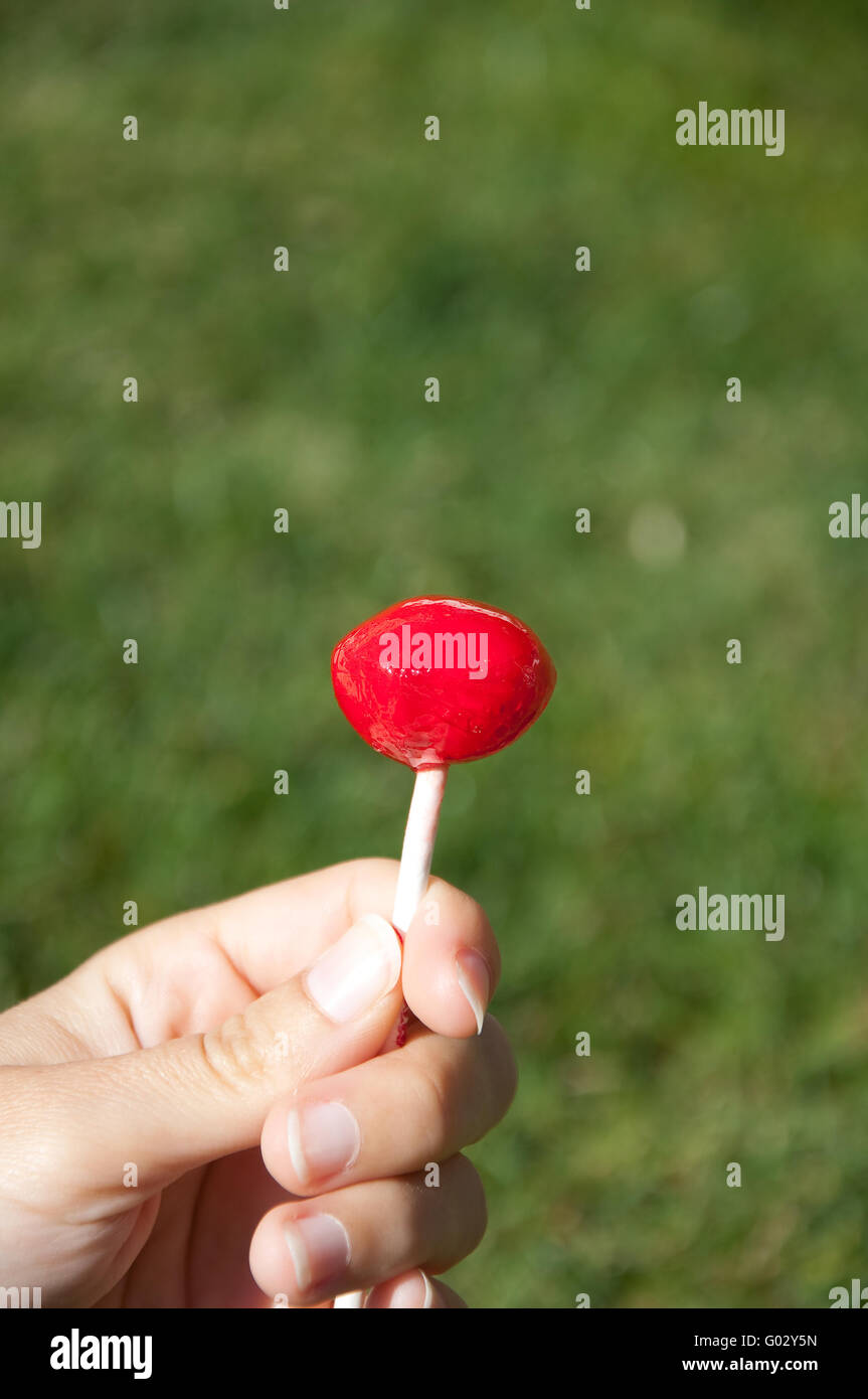 lollipops grass background Stock Photo