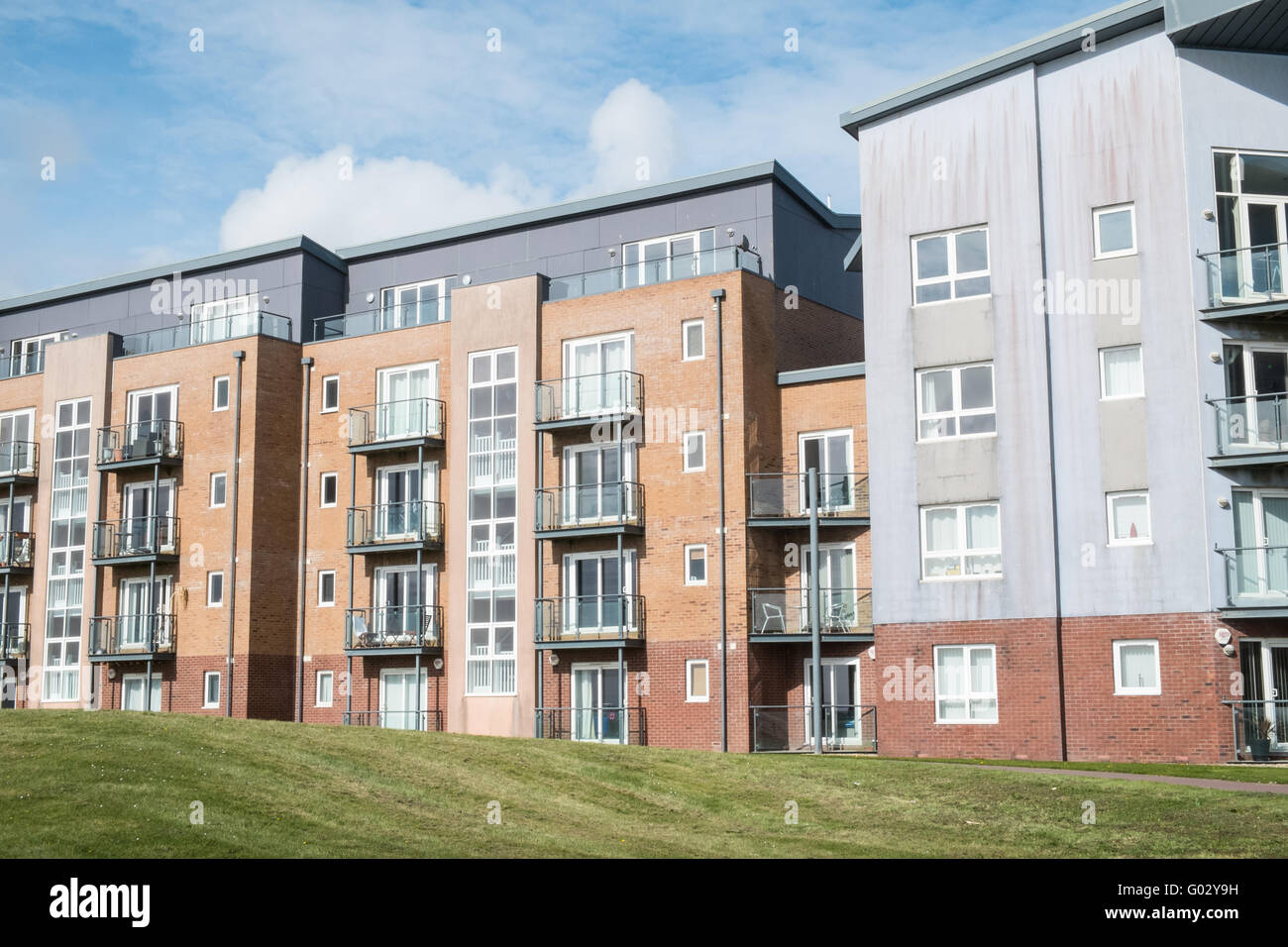 Apartments at the old dock at Llanelli's Millennium Quay.Llanelli beach