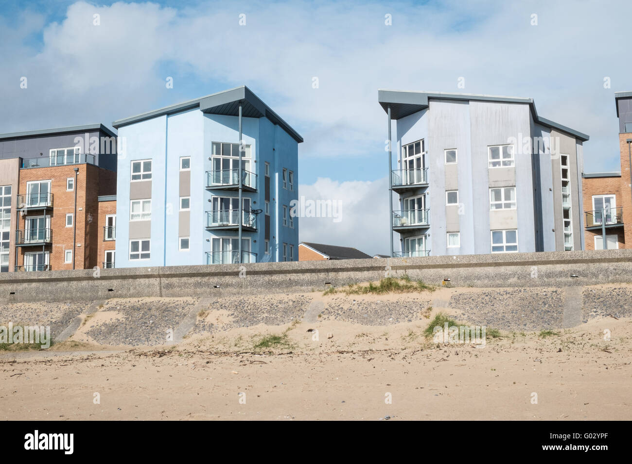 Apartments at the old dock at Llanelli's Millennium Quay.Llanelli beach