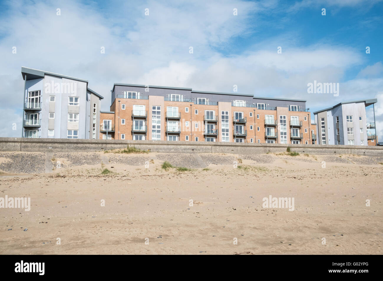 Apartments at the old dock at Llanelli's Millennium Quay.Llanelli beach