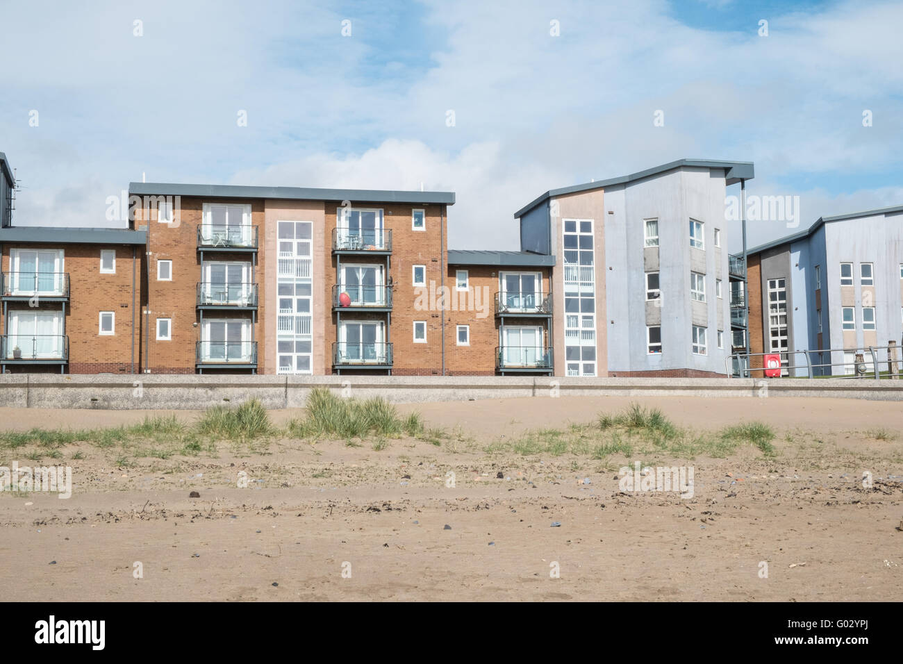 Apartments at the old dock at Llanelli's Millennium Quay.Llanelli beach