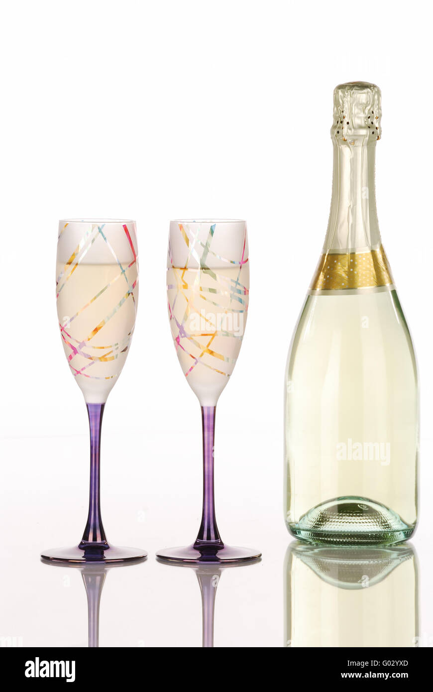 Champagne bottle with two festive glasses Stock Photo - Alamy