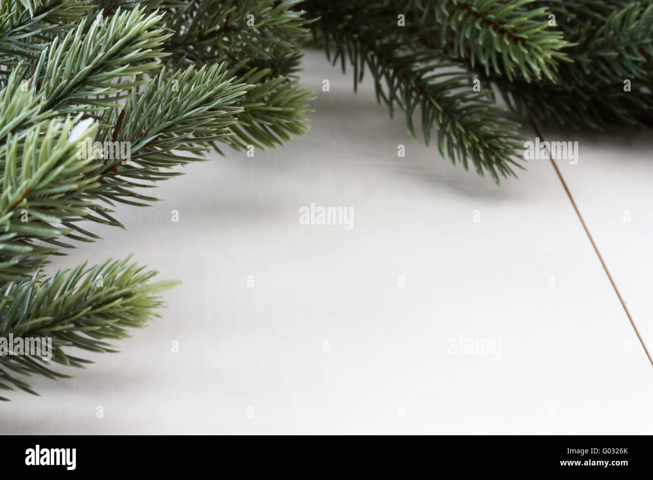 Weihnachtshintergrund mit Tannenzweigen - Christmas background with fir boughs Stock Photo