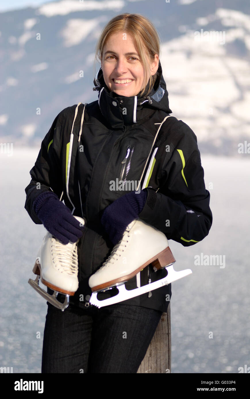 Woman ice skating Stock Photo