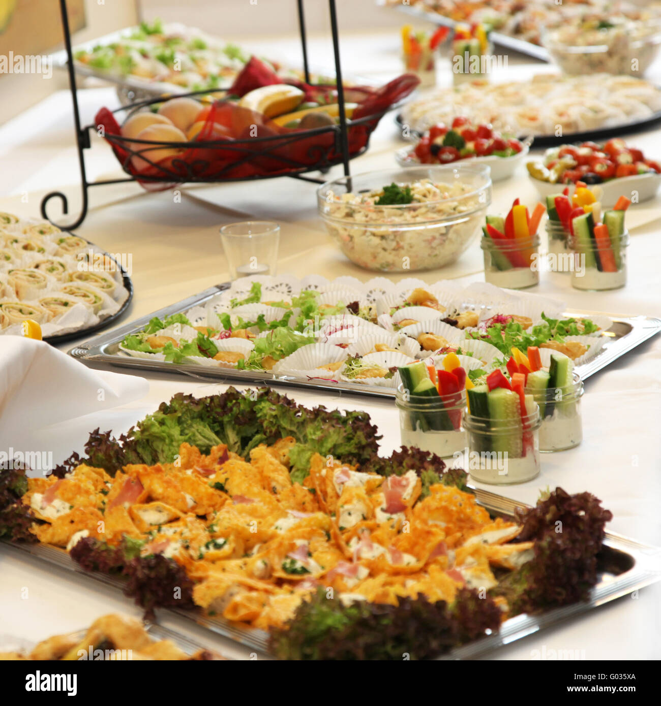 Buffet of different foods and salad - square Stock Photo