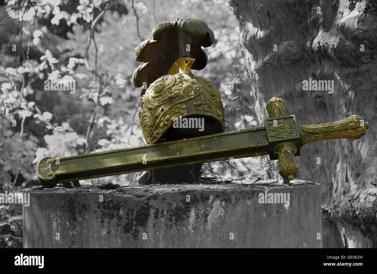 Cemetery sculpture - sword and helmet Stock Photo