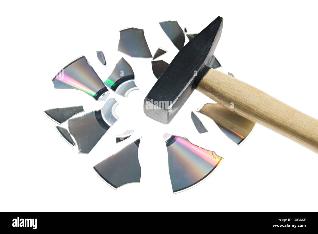 Broken compact disk with a hammer isolated over wh Stock Photo