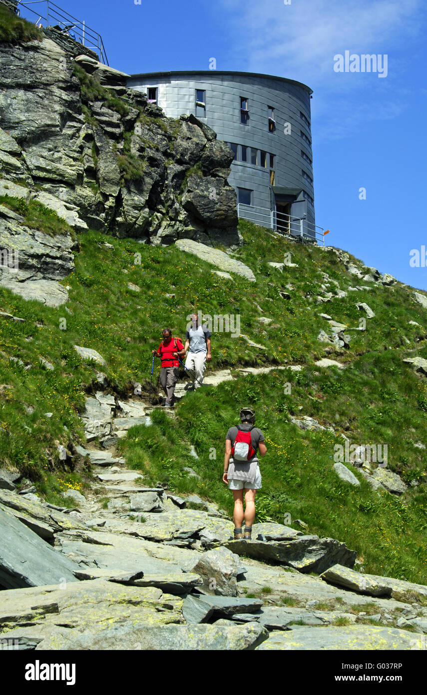 Hikers at the Velan refuge, Valais, Switzerland Stock Photo
