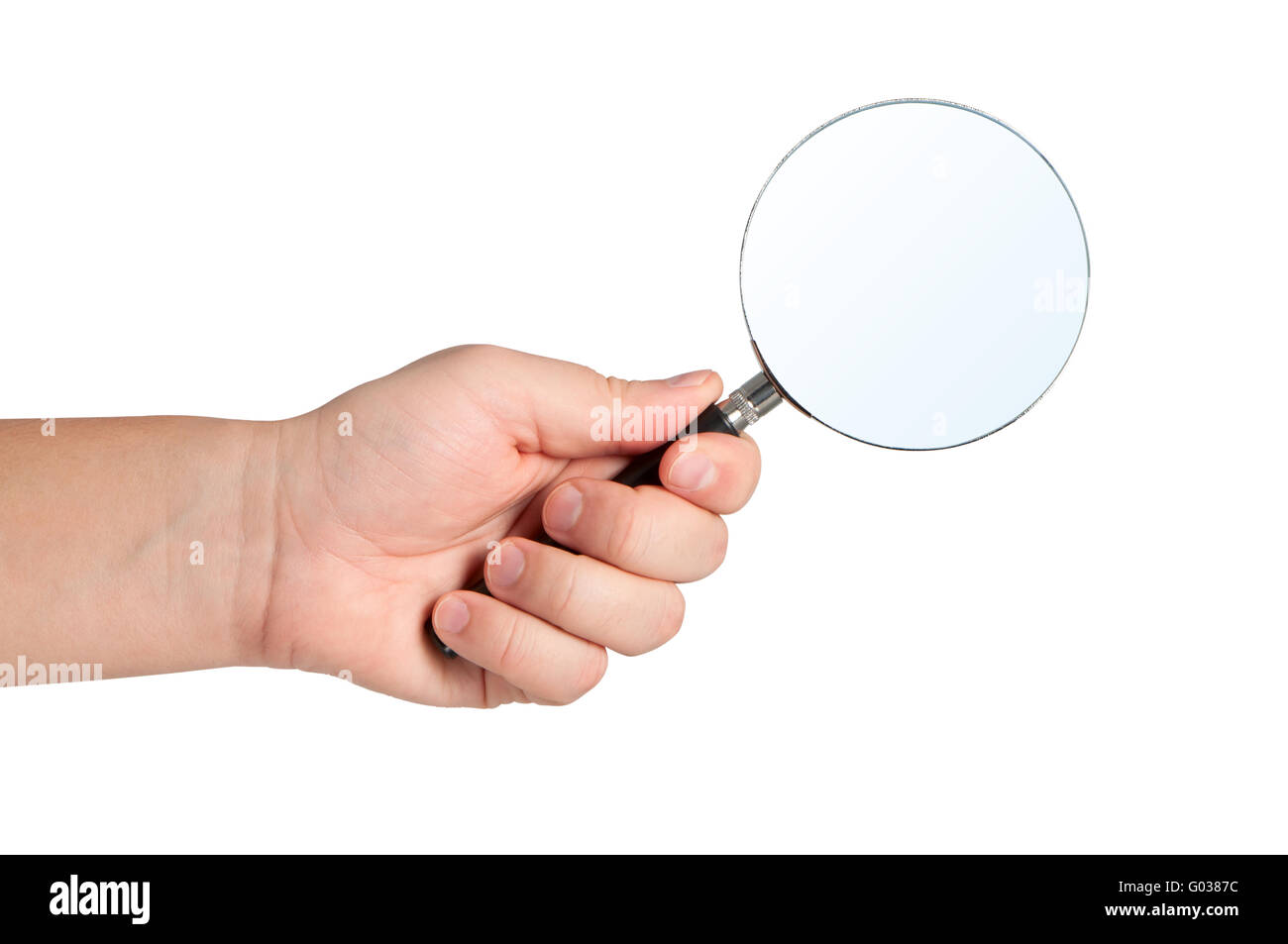 Magnifying glass in hand isolated on white background. Stock Photo
