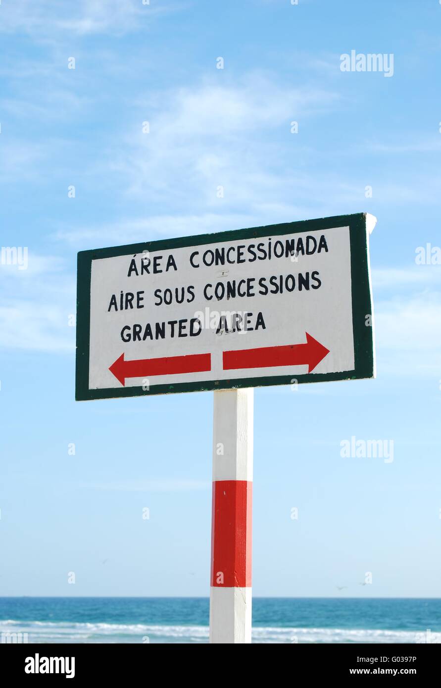 wooden sign at the beach in different languages Stock Photo Alamy