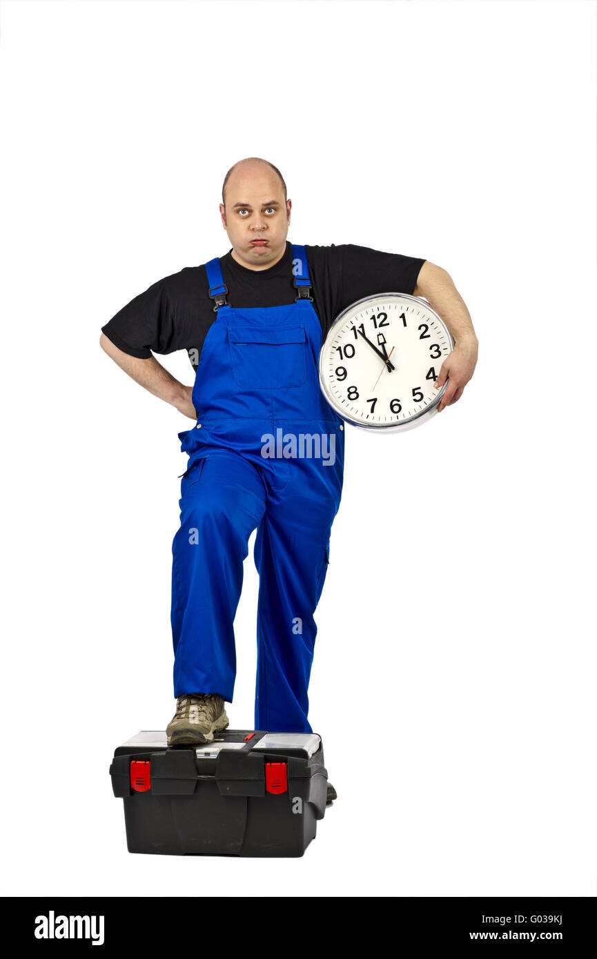 Construction workers with a clock in his hand Stock Photo