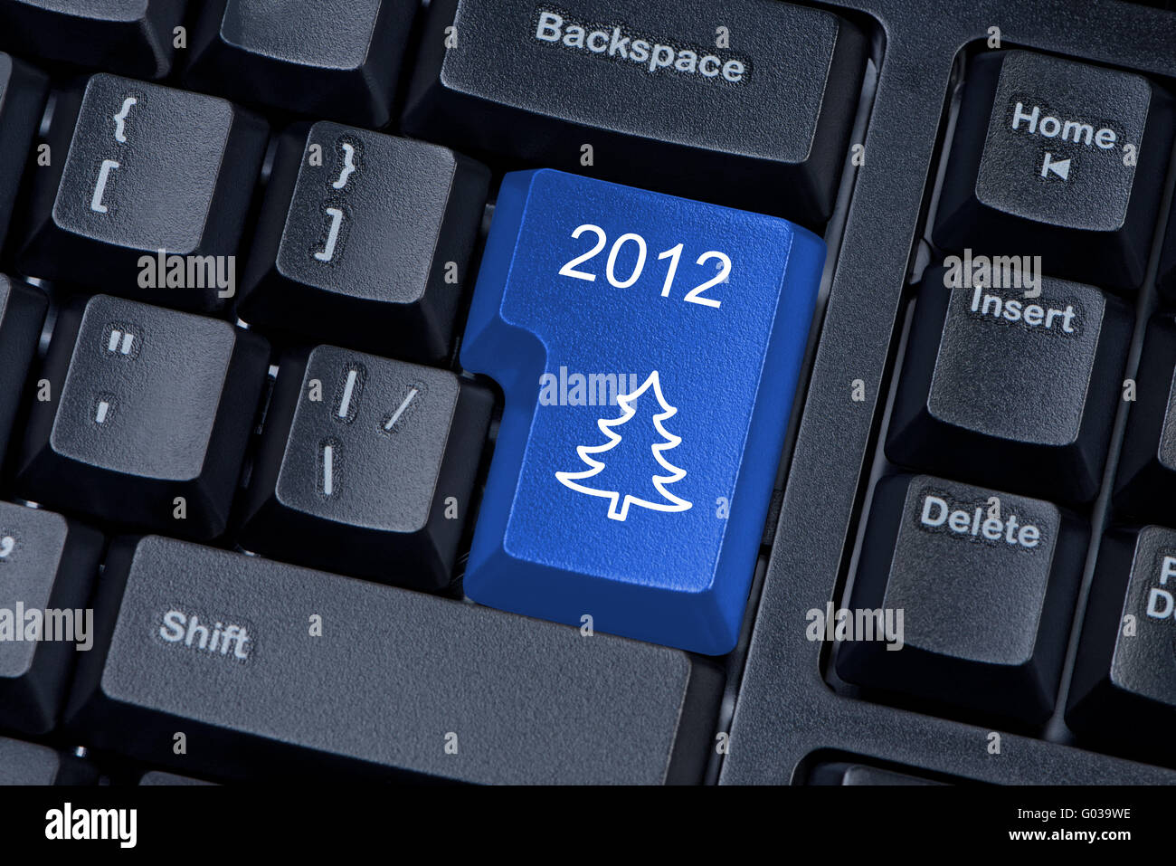 Christmas tree blue button computer keyboard internet concept. Stock Photo