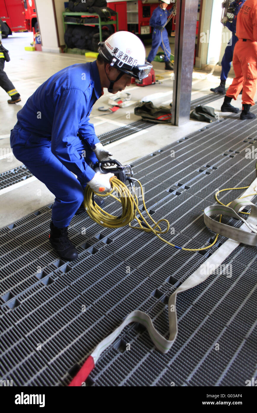 Firefighter with technical equipment. Stock Photo